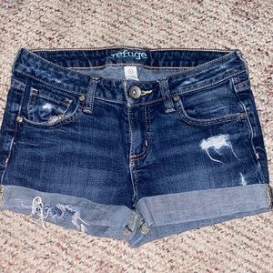 refuge ripped blue jeans
